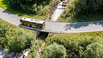 A Postbus on its way through the Diemtigtal Nature Park