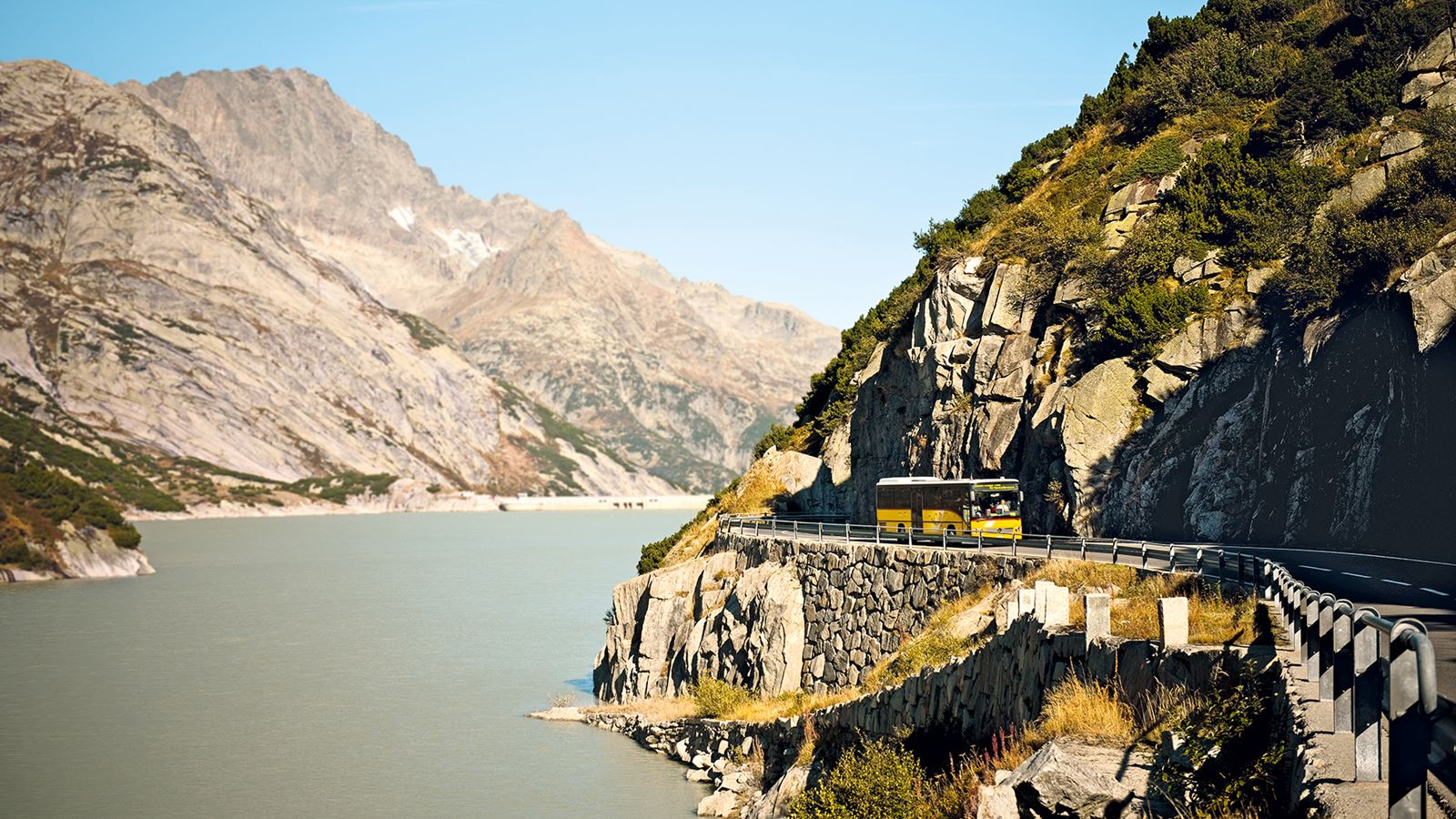A Postbus travels over the Grimsel Pass.