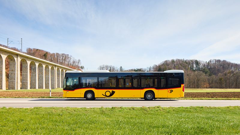 Common visual identity with modernized logo for Swiss Post and PostBus.