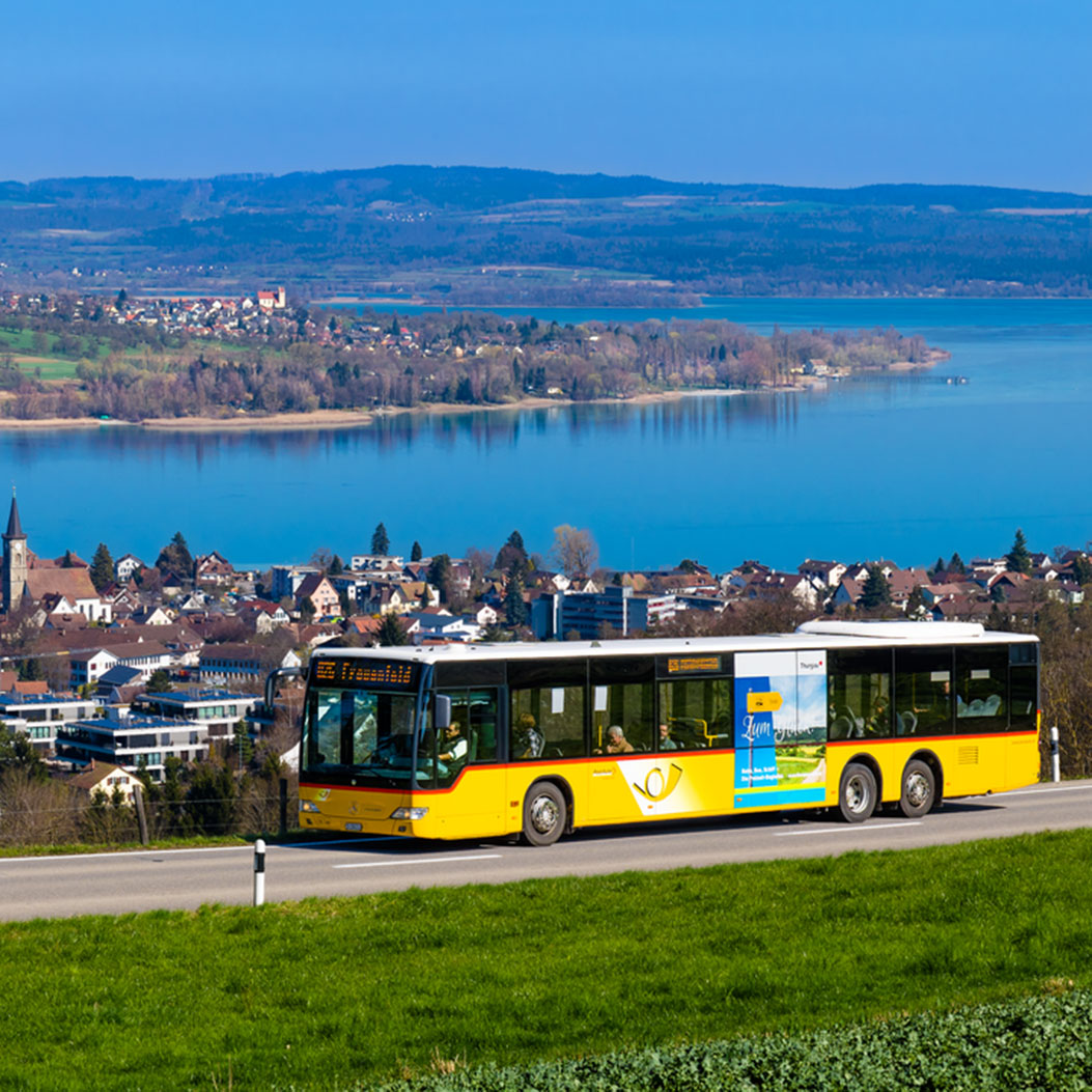 PostBus drives along a country road