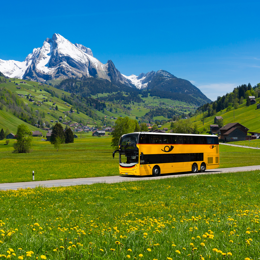 The double-decker PostBus in Toggenburg