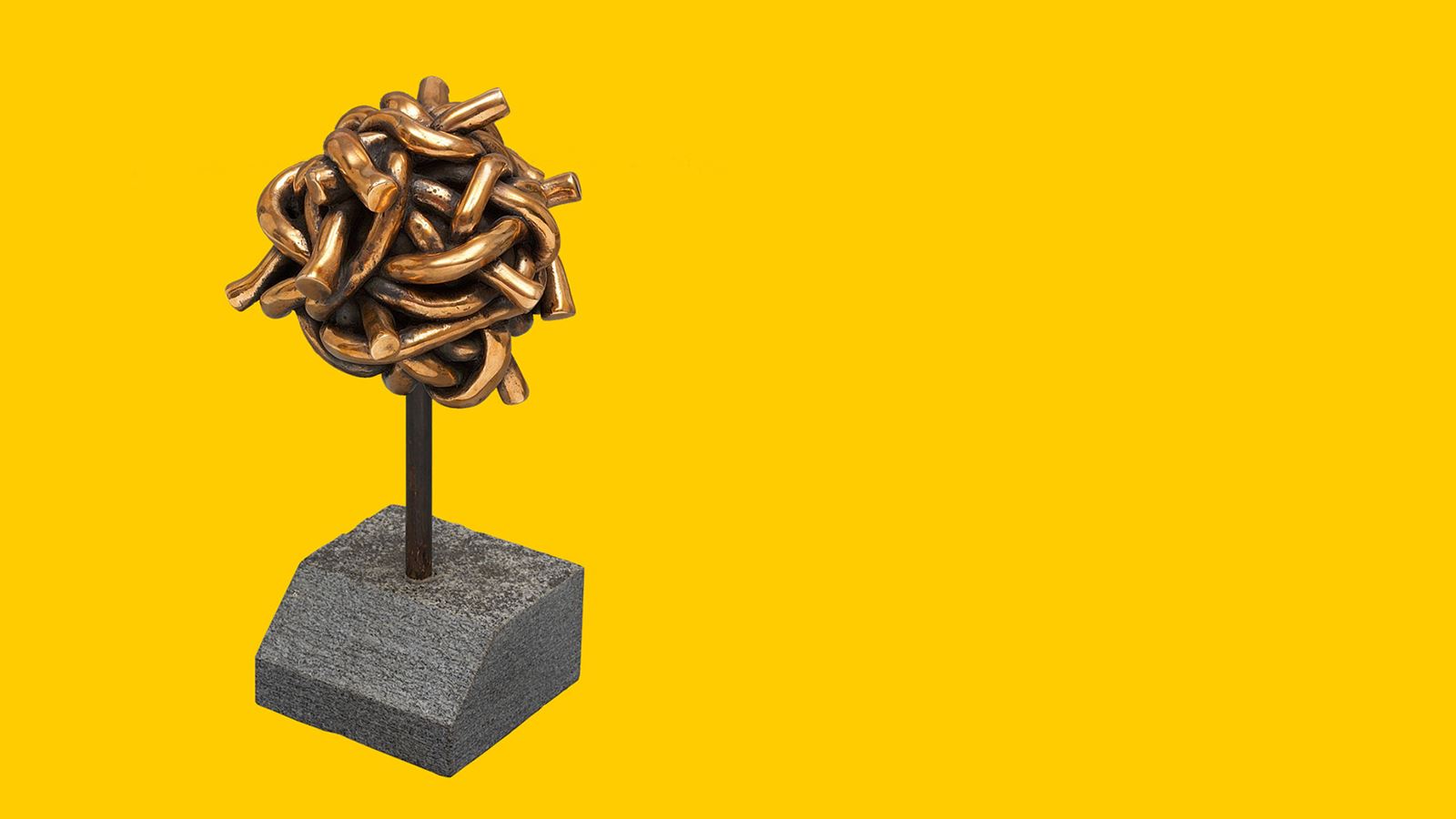 Die trophäe “Goldener Verkehrsknoten” mit einem gelben Hintergrund