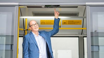 Markus Schüpbach shows a sensor on one of the 960 counting vehicles.